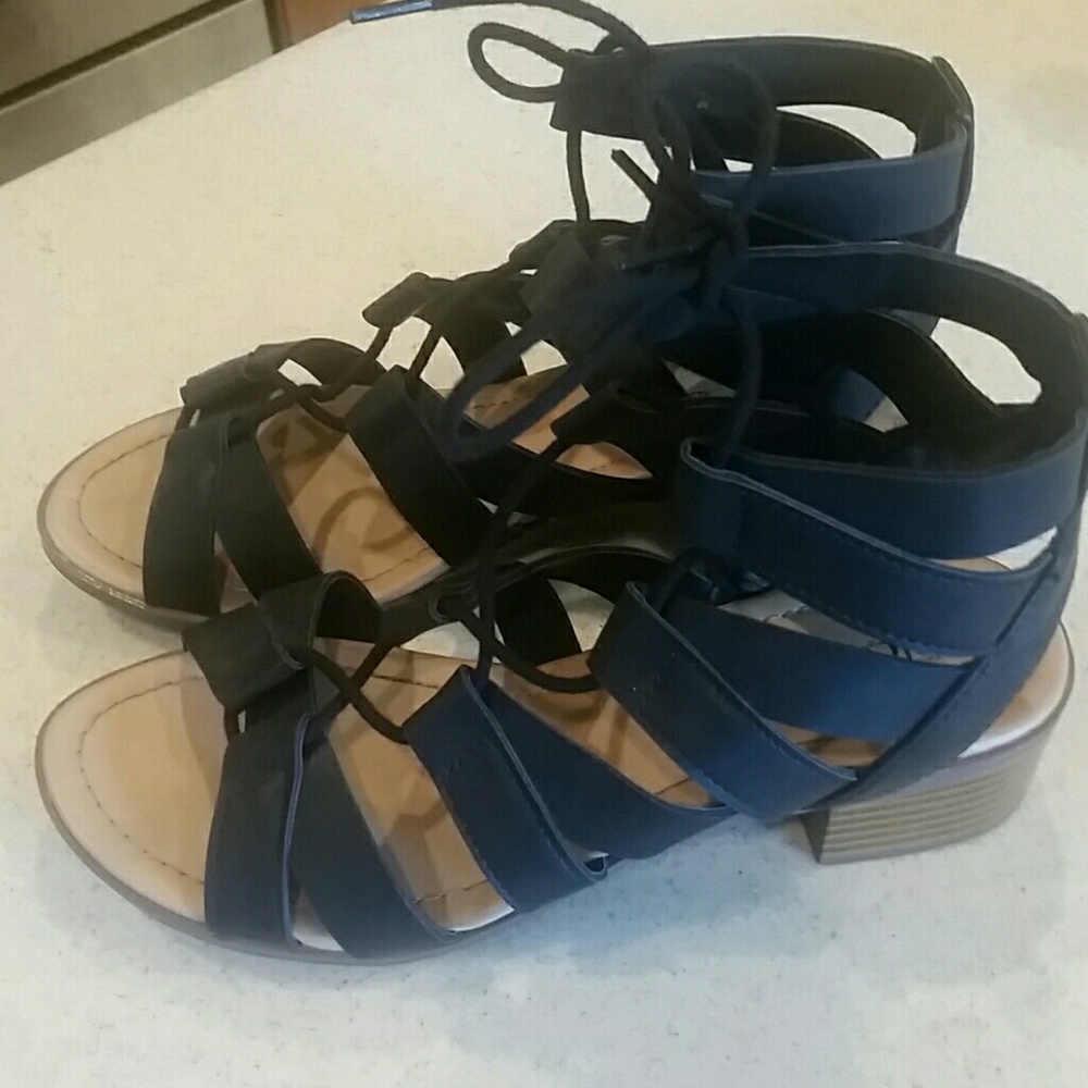 Open toe wedges with ankle tie.